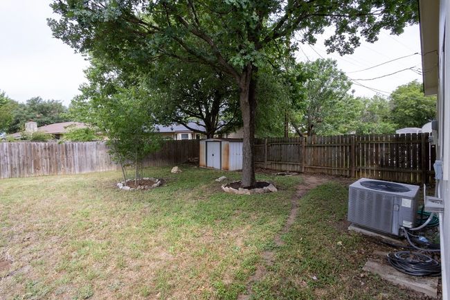 View of yard with central AC unit | Image 35