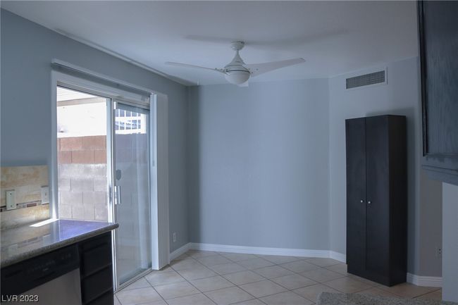 Sliding door off the dining room leads to backyard | Image 8