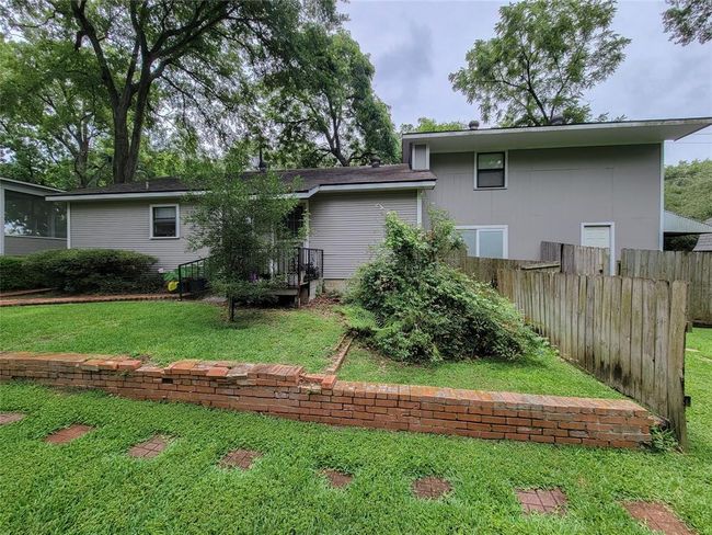 Guest Suite B: Furnished 2-story w/living room, kitchen, bathroom, upstairs bedroom, small fenced patio accessable to backyard space.. approx 720SF addition | Image 41
