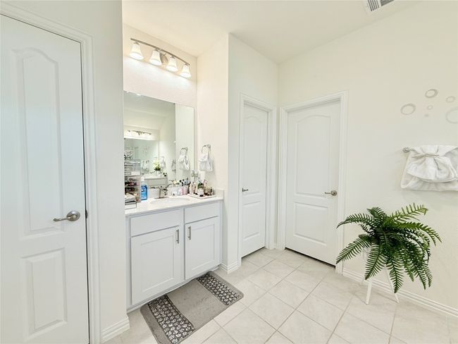 Bathroom with vanity and tile patterned floors | Image 31