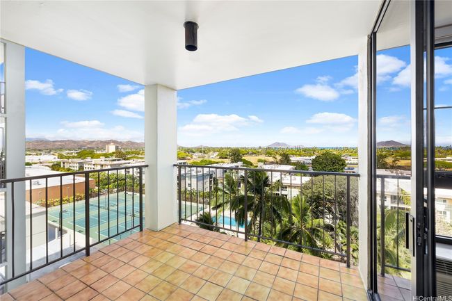 Entrance to a relaxing lanai area. | Image 19