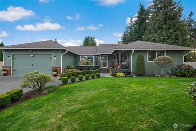 Landscaped Yard Encircles Home | Image 3