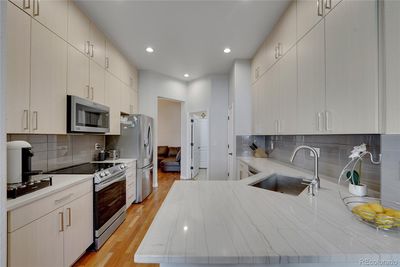 Hardwood floors, quartz countertops | Image 1