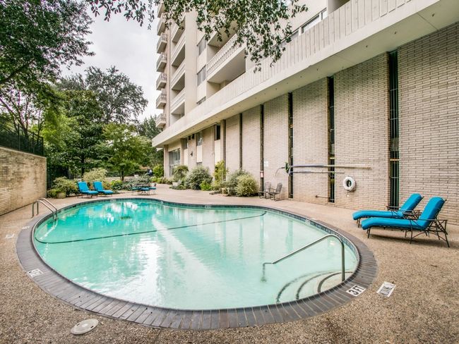 View of heated swimming pool and patio area. It's very private and secluded! | Image 25