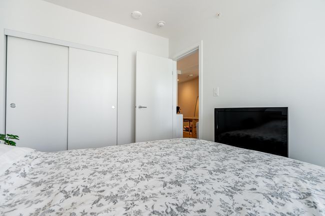 Bedroom featuring a closet | Image 24