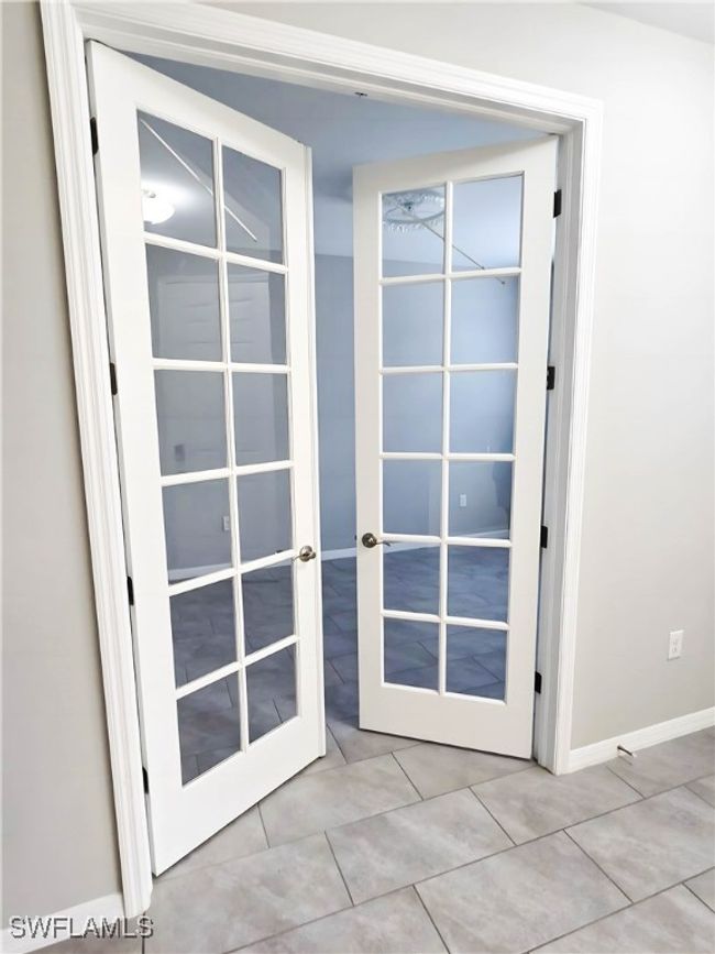 Entryway featuring french doors, tile patterned flooring, and​​‌​​​​‌​​‌‌​‌‌​​​‌‌​​‌‌​‌​​​​​‌ baseboards | Image 7