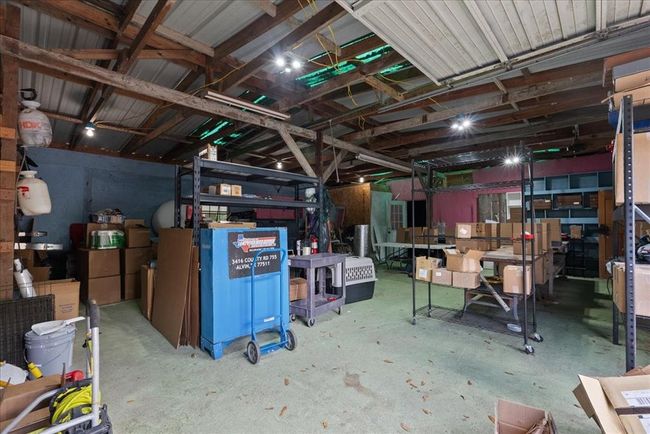 Multi-use outbuilding with electricity and plenty of storage space. | Image 48