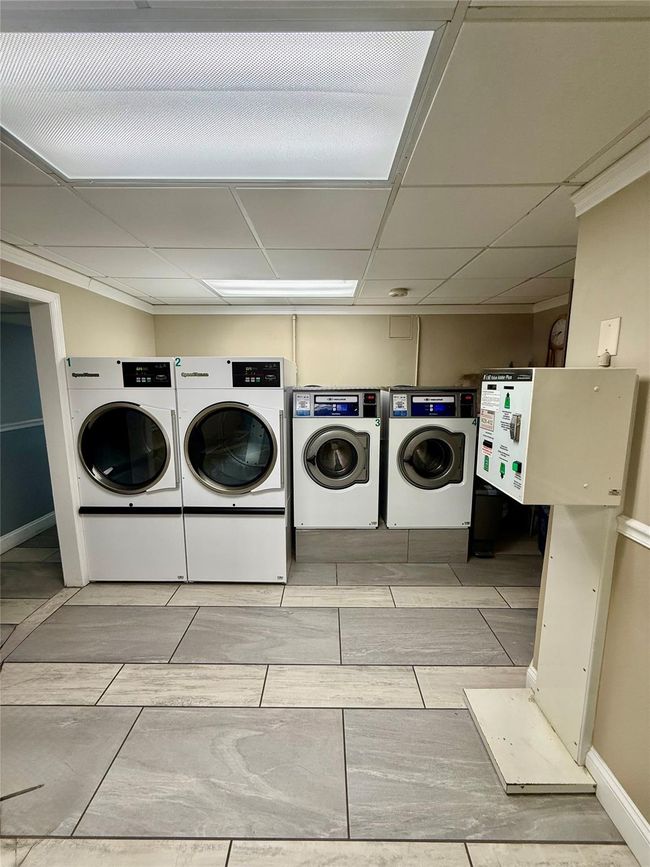 Shared laundry area with washer and dryer | Image 14