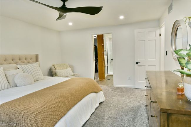 Bedroom featuring visible vents, recessed lighting, light carpet, and a ceiling fan | Image 26