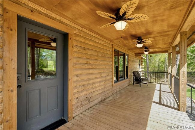 Roadside porch with cedar ceiling and ceiling fans | Image 7
