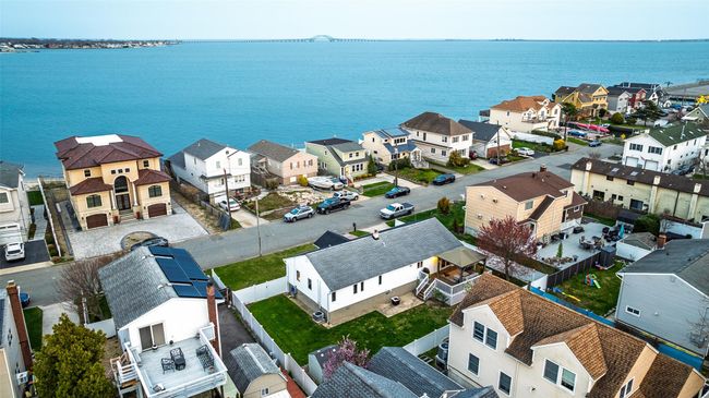 Drone / aerial view featuring a residential view and a water view | Image 7