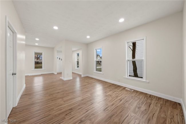 Unfurnished living room featuring light hardwood / wood-style floors | Image 8