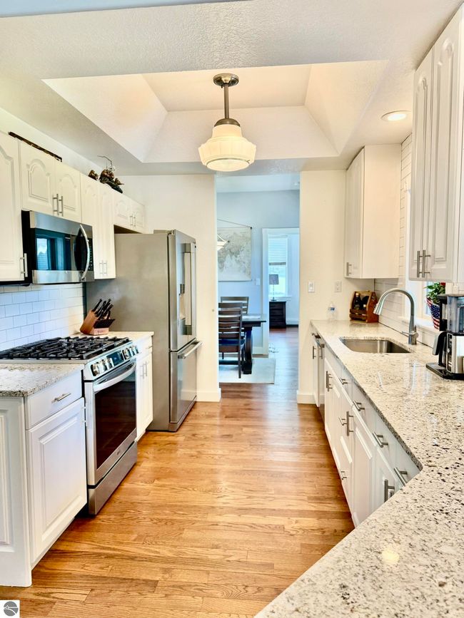 5867 Mabel Rd, House other with 5 bedrooms, 3 bathrooms and null parking in Williamsburg MI | Image 18