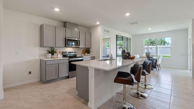 5206 Orchard Oriole Loop, House other with 3 bedrooms, 2 bathrooms and null parking in Bartow FL | Image 12