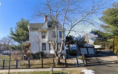 View of front of house with a garage | Image 1