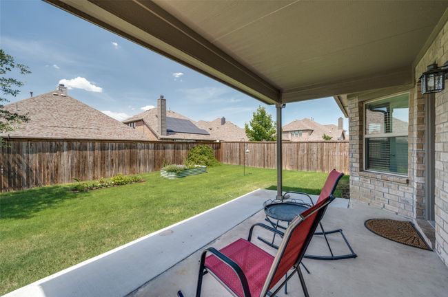 Shaded porch with room for pets, kids or gardening | Image 19