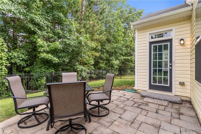 View of patio with outdoor dining area | Image 35