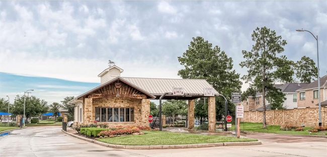 Guard gate entrance off Rayford. This is a 24 hr manned guard gated community. We also have a back gate entrance/exit. | Image 34