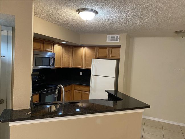 APT-1615 - 4524 Commander Dr, Condo with 2 bedrooms, 1 bathrooms and null parking in ORLANDO FL | Image 5