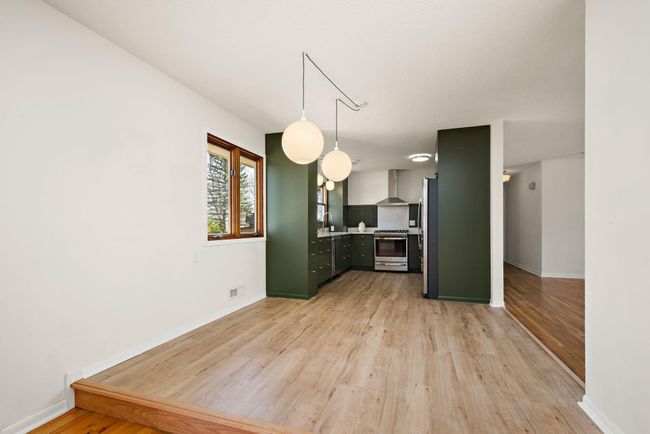 Dining area next to the kitchen | Image 11
