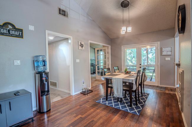 Dining room adjacent to living and kitchen. | Image 9