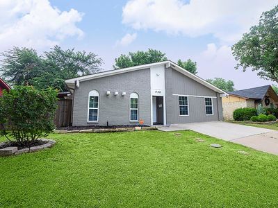 View of front of home with a front lawn | Image 1