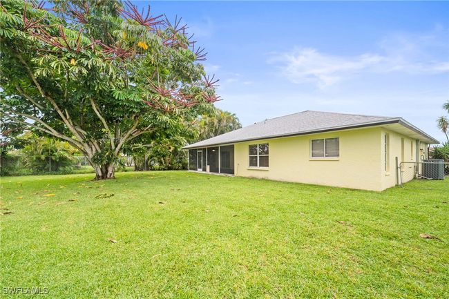 View of yard with a sunroom | Image 30