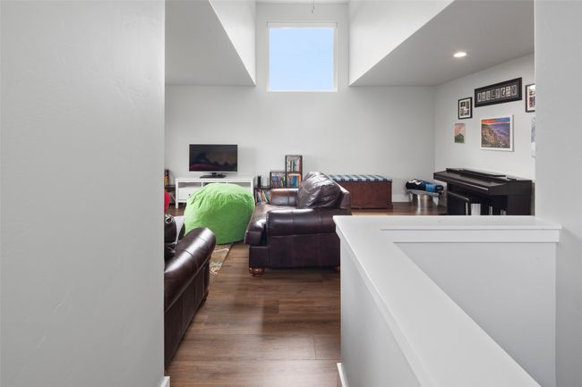 Upper level entry to family room. | Image 42