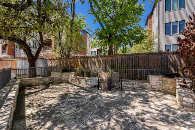 Fenced backyard featuring a patio area | Image 25