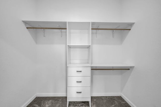 Primary bedroom walk in closet | Image 25
