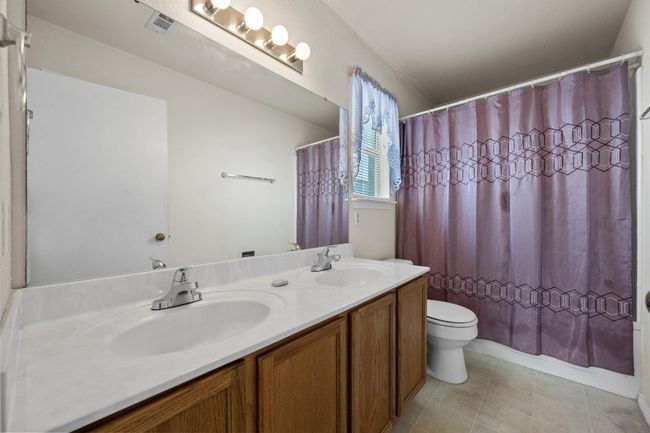 Full bathroom with double vanity and toilet | Image 18