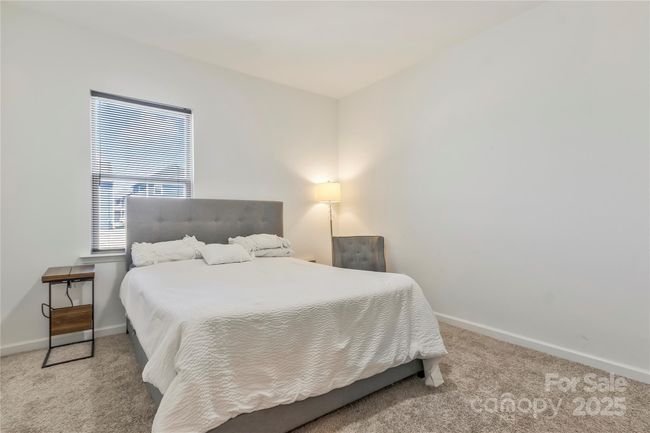 Spacious guest bedroom on the main with huge walk-in closet. | Image 12