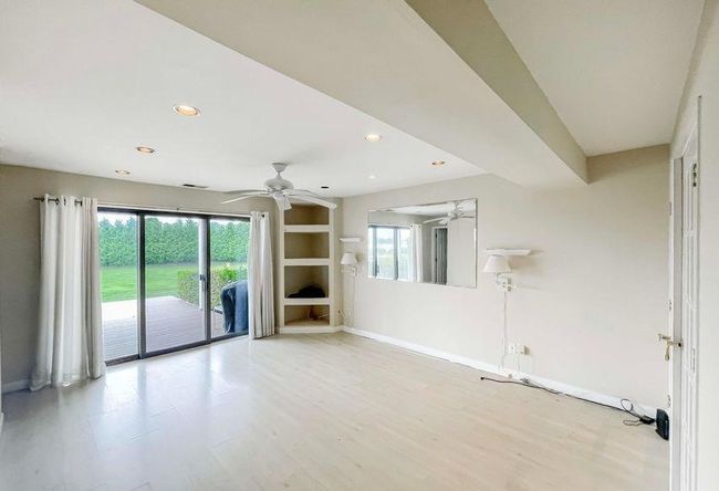 Unfurnished room featuring light wood-style flooring, recessed lighting, baseboards, and ceiling fan | Image 15