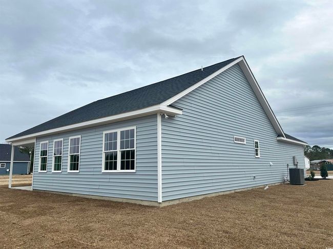View of side of home with central AC | Image 23