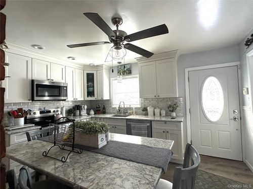 166 Choir Ln, Westbury, NY, 11590-5733 | Card Image