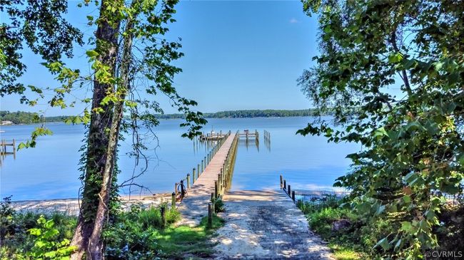 Water view with a boat dock | Image 14