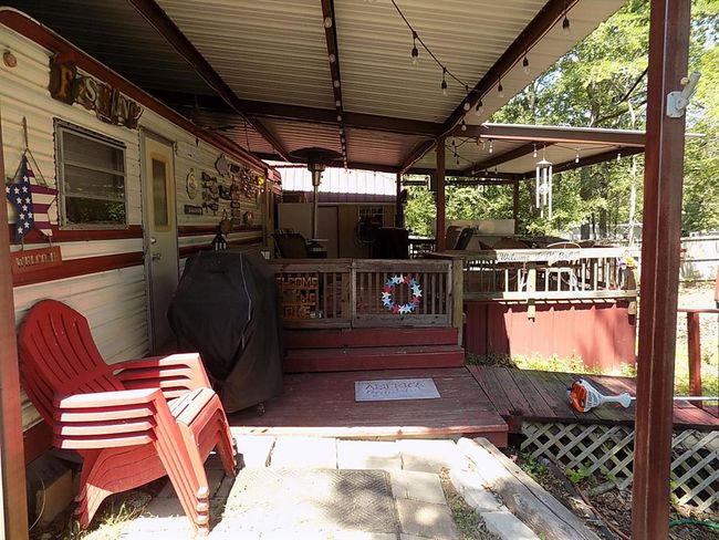 View of deck, lots of covered outdoor living space. | Image 7