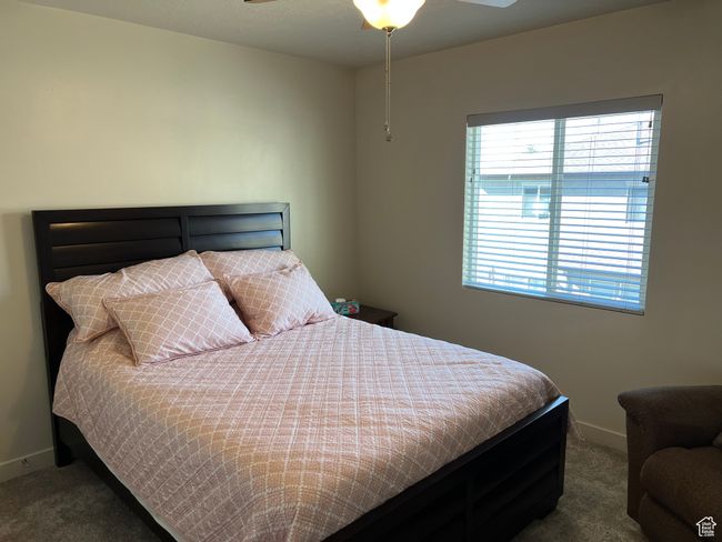 Bedroom with baseboards and carpet | Image 20