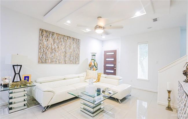 Tiled living room featuring ceiling fan | Image 8
