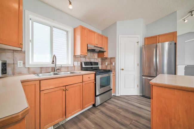 38 Saddlemead Way Ne, House other with 4 bedrooms, 2 bathrooms and 2 parking in Calgary AB | Image 9