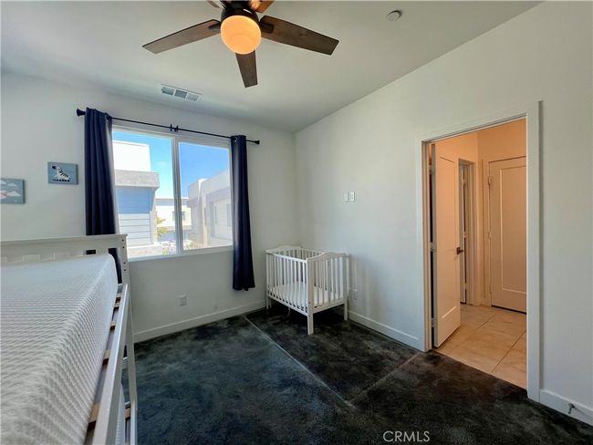 The equally spacious 4th bedroom that connects to the Jack and Jill bathroom. | Image 22