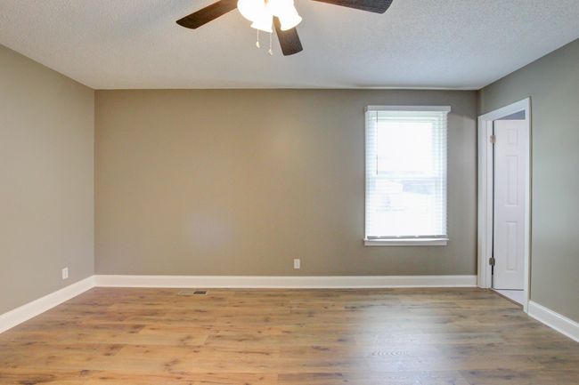 Primary Bedroom with full bath and walk in closet | Image 16