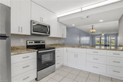 4207-4200 Looking Glass Ln, NAPLES, FL, 34112-5213 | Card Image