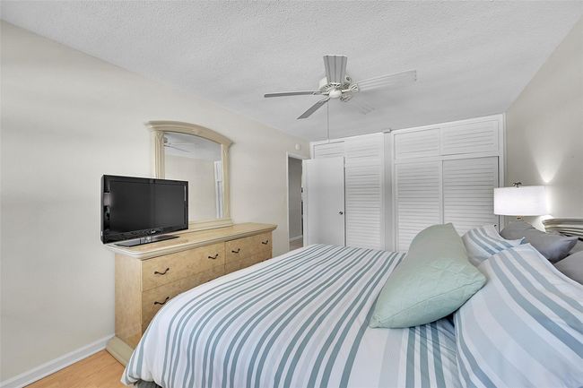 Primary Bedroom was Just Freshly Painted. Being Sold Furnished and Turn-Key. Primary Bedroom includes a King Sized Bedroom Suite and lots of Closet Space! | Image 45