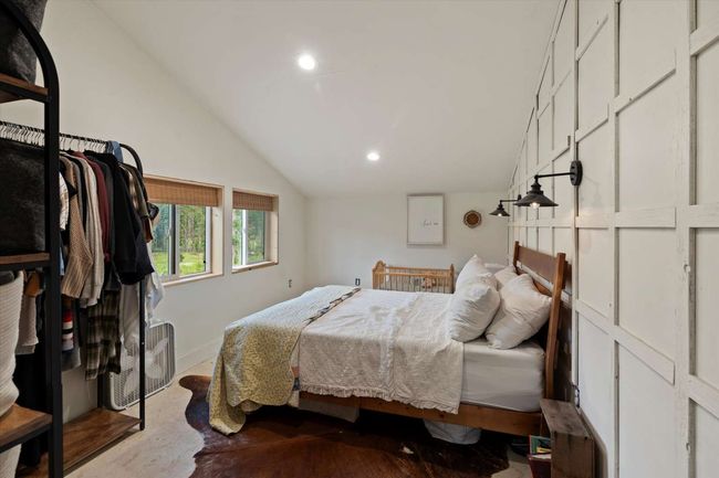 Bedroom with vaulted ceiling and recessed lighting | Image 31
