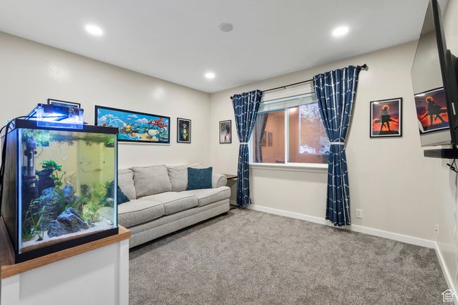 Living area with carpet floors and recessed lighting | Image 18