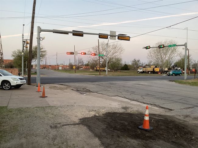 View of street featuring traffic lights | Image 5