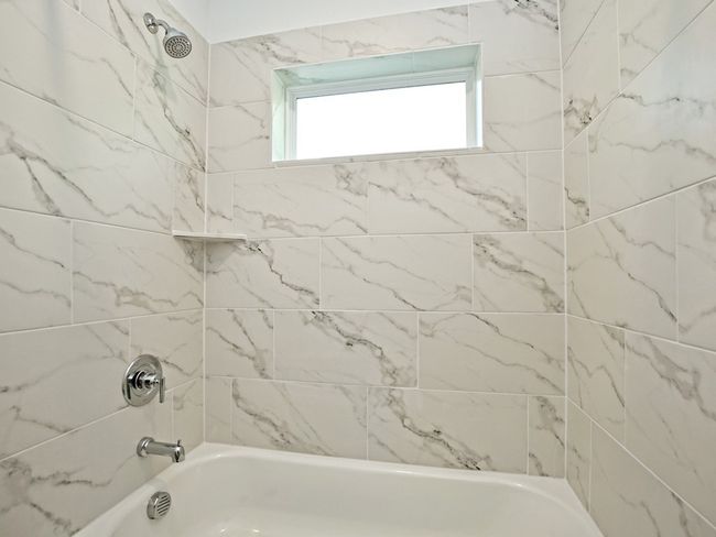 Full bath featuring shower / bathtub combination | Image 22