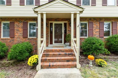 A Covered Front Porch Greets you and your guests. | Image 2