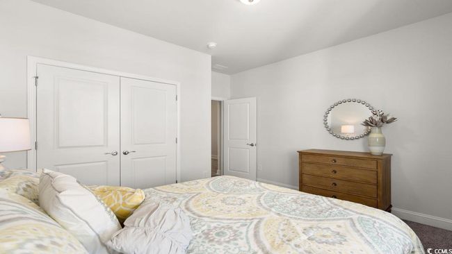 Bedroom featuring a closet, carpet, and baseboards | Image 24